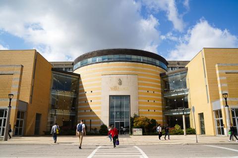 Students walking in front of Vari Hall